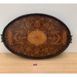 A pair of 19th century oval mahogany trays, marquetry inlaid with fan patera, urns, swags and