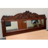A Victorian mahogany scroll carved overmantle mirror. 32' high x 70' wide