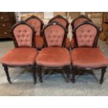 A set of six Victorian mahogany salon chairs on fluted tapered legs