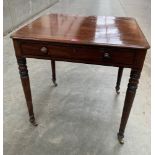 A Regency mahogany side table with frieze drawer on ring turned tapered legs. 27' wide
