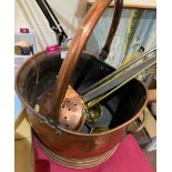 A copper coal bucket, chestnut roaster and brassware