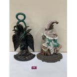 Two Victorian cast iron doorstops, one in the form of Mr Punch, 12' high; the other a phoenix, 14'