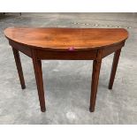 A 19th century mahogany demi-lune side table on moulded square legs. 45' wide