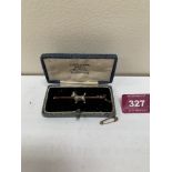 A 15ct bar brooch with Scottie dog to the knife wire