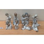 A set of eight Lladro figures of angels