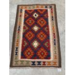 A Mainana Kilim rug. 1.28m x 0.9m