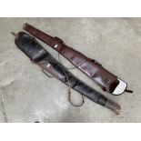 Two leather gun cases