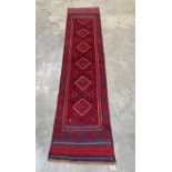 A Meshwani carpet runner. 2.55m x 0.61m