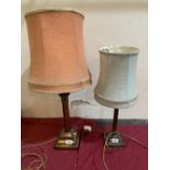 Two corinthian based table lamps