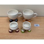Two Carlton Ware 'walking' teacups and two eggcups