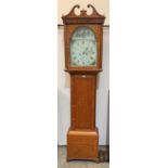 A 19th century oak 8 day longcase clock with painted break-arch dial. 85' high