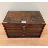 An oak and brass bound tool chest, the top stamped BSA Ltd. 15' wide