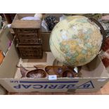 A terrestial globe, a pair of miniature oak chests of drawers and a nut dish