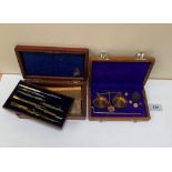 A set of drawing instruments in mahogany case together with cased jeweller's scales