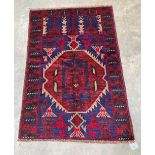 A Balochi rug. 1.25m x 0.89m