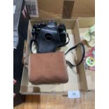 A Ricoh XR-I 35mm camera and a Kodak Brownie box camera