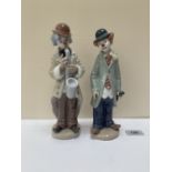 Two Lladro figures of pierrots. 9' high