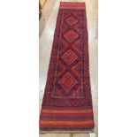 A Meshwani carpet runner. 2.46m x 0.6m