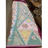 A patchwork quilt. 101' x 92' approx.