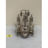 A George II silver Warwick cruet with a large caster, two smaller casters and two oil or vinegar