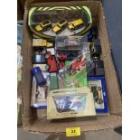 A box of diecast model vehicles; a box of vintage puzzles and games and a folder of 31 childrens'