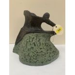 A studio pottery jug of heavy sculptured form. 11' high