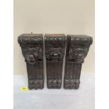 Three oak corbels, carved with lion masks. 12½' high