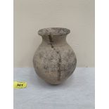 A North African pottery storage jar. Roman period c.1st century A.D. 6' high