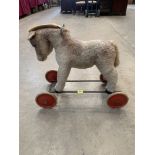 A Steiff push-along horse. Button in ear. 22' high. c.1950s