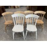A set of four spindle back kitchen chairs and a pair. (6)
