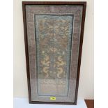 A framed Chinese textile embroidered with dragons, flaming pearls and other auspicious motifs. 26' x