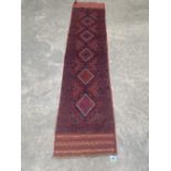 A Meshwani carpet runner. 2.6m x 0.61m