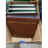 The albums of stamps with a Royal Mail Presentation album