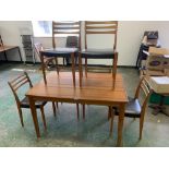 A 1970s Swedish drawleaf dining table and a set of six chairs