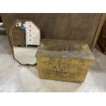 An octagonal shell moulded wall mirror with bevelled plate and a brass embossed log box