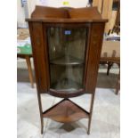 An Edward VII mahogany inlaid bow-breakfronted corner china display cabinet