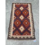 A Maimana Kilim rug. 1.36m x 0.81m