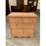 A late Victorian pine chest of two short over two long drawers. 35' wide