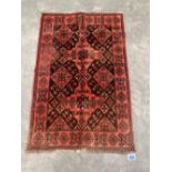 A Balochi rug. 1.18m x 0.7m