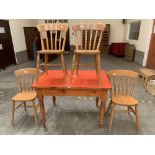 A 45' pine kitchen table with a set of four lath back chairs