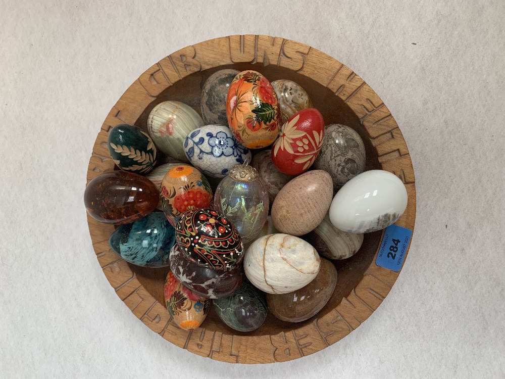 A collection of hardstone and other eggs