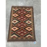 A Maimana Kilim rug. 0.89m x 0.62m