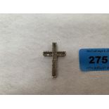 A white stone set crucifix. 4g gross. 32mm high