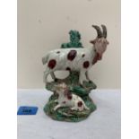 A 19th century Staffordshire group of two rams. 6½' high