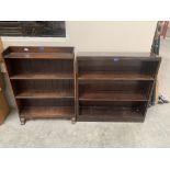 An oak open bookcase and a mahogany example