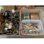 Two boxes of metalware and cutlery