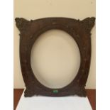 A Victorian oak and parcel gilt picture frame. 26' high