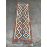 A Choli Kilim carpet runner. 1.9m x 0.62m