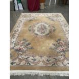 A Chinese carpet, 12' x 9'. Bears a label for Frith. 45' wide