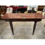A pair of George IV mahogany pier tables on tapered reeded legs. 54' wide
